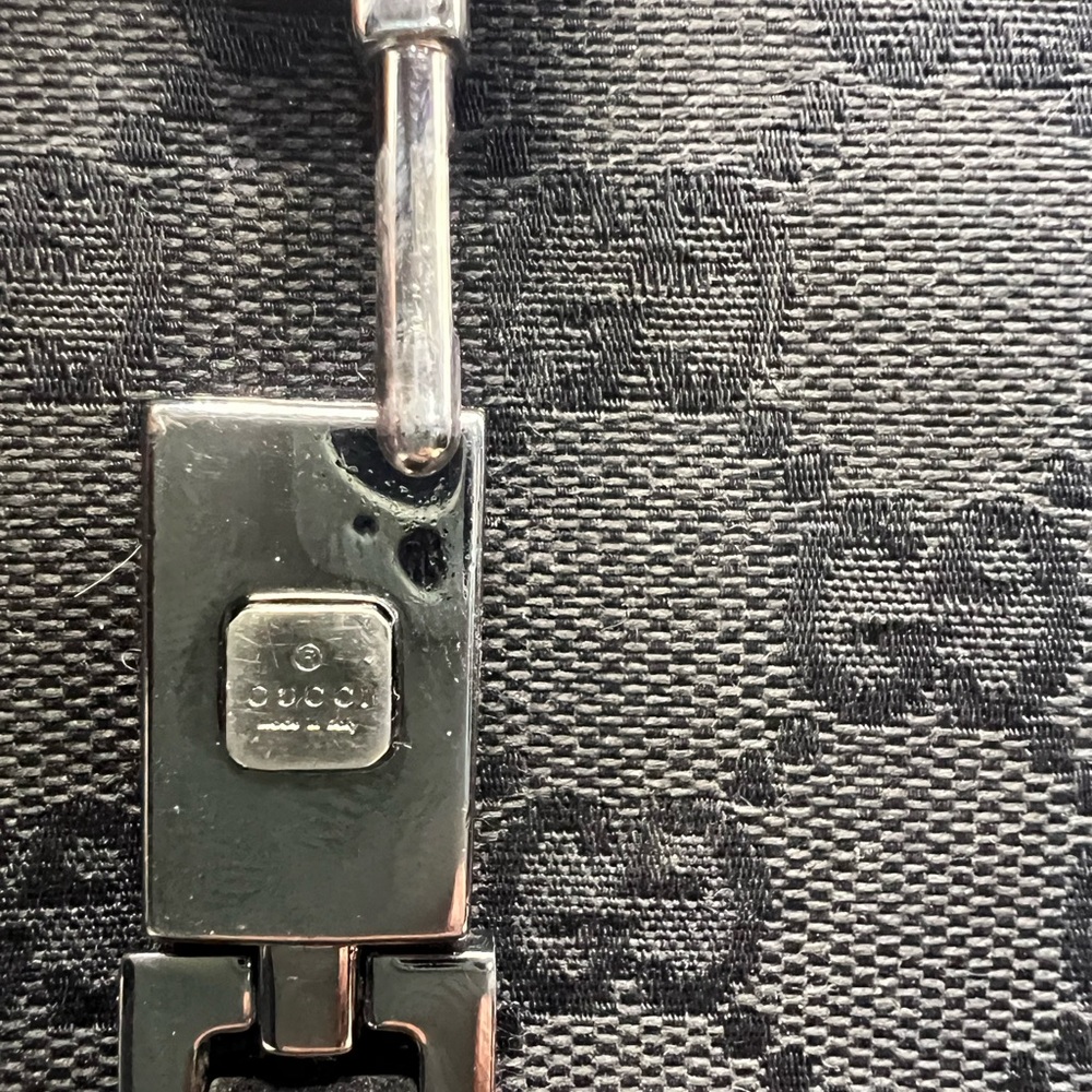 Gucci Black GG Canvas
Piston Lock Compact Wallet. - Picture 5 of 8
